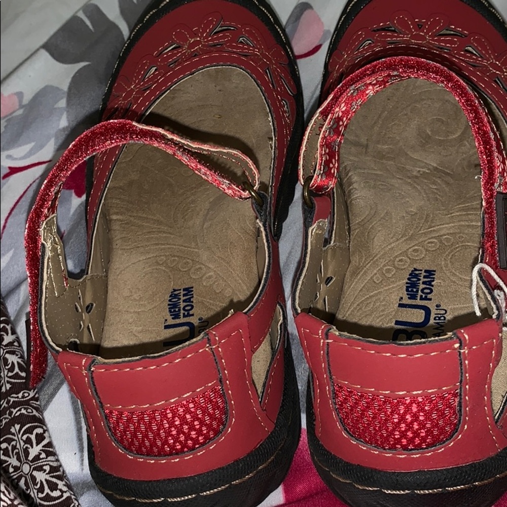 One pair shoes red color